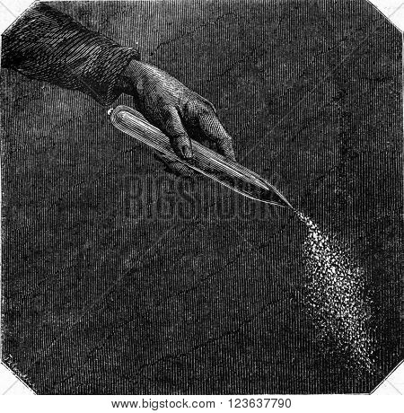 Combustion of pyrophoric iron, vintage engraved illustration. Magasin Pittoresque 1869.