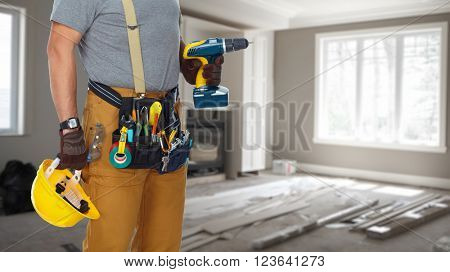 Builder handyman with drill.