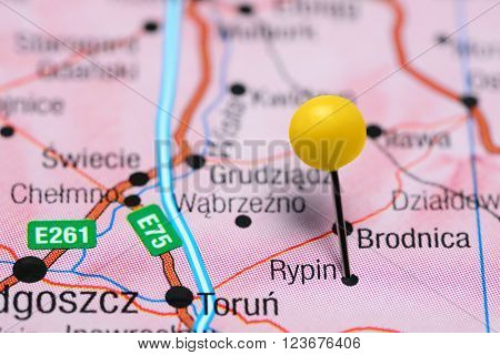 Photo of pinned Rypin on a map of Poland. May be used as illustration for traveling theme.
