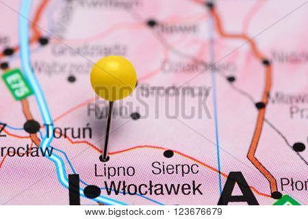 Photo of pinned Lipno on a map of Poland. May be used as illustration for traveling theme.
