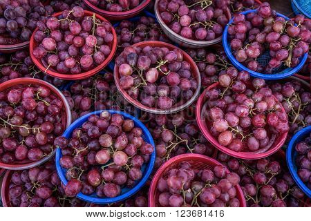 A shot of grapes in mini baskets taken at a local market in Johor Malaysia.