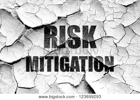 Grunge cracked Risk mitigation sign with some smooth lines and highlights