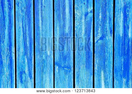 Old blue wooden fence with wooden texture