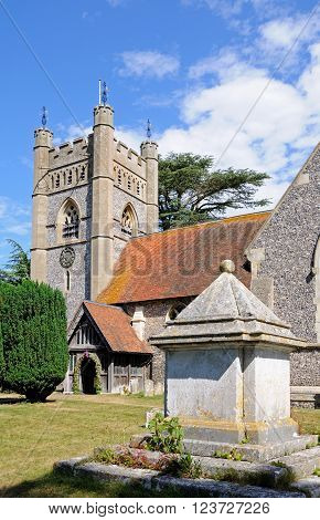 HAMBLEDON, UK - JULY 10, 2015 - St Marys church and churchyard in the village centre Hambledon Oxfordshire England UK Western Europe, July 10, 2015.