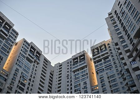 Looking up at the architecture of Skyscrapers with blue sky background in a modern city.