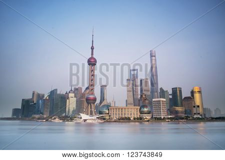 SHANGHAI CHINA - MAR 28: The Pudong district and the Huang Pu River view from The Shanghai Bund. taken on Mar 28, 2015, Shanghai, China.