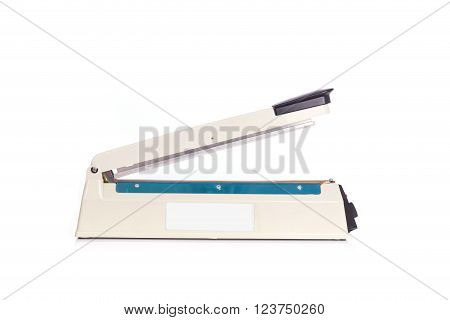 Close up plastic bag sealer isolated on white background