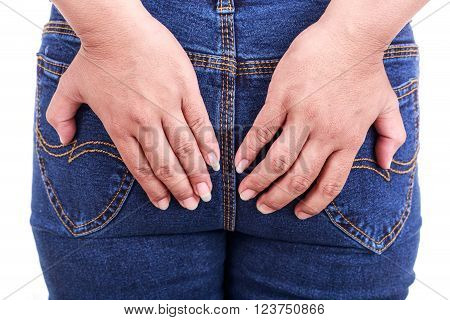 Woman's Hand Holding The Backside : Concept Hemorrhoids