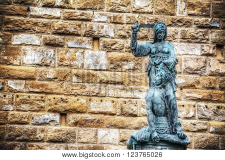 Giuditta and Oloferne bronze statue in Piazza della Signoria in Florence Italy