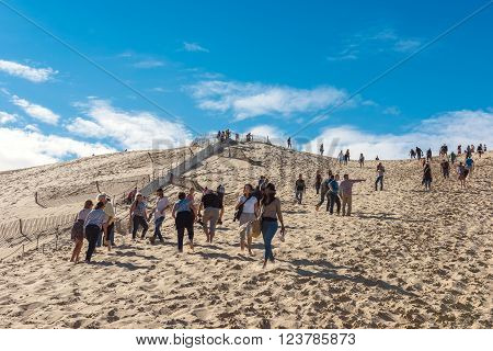 FRANCE, LA TESTE-DE-BUCH - SEPTEMBER 19: people visiting the famous highest sand dune in Europe Dune of Pyla on September 19, 2015