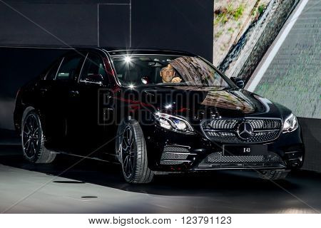 NEW YORK - March 23: A Mercedes E 43 with Dietmar Exler, president and chief executive officer of Mercedes-Benz USA LCC  exhibit at the 2016 New York International Auto Show during Press day. 