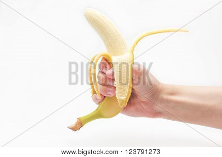 A banana in a man's hand on a