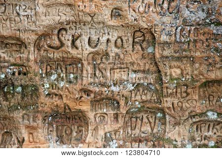 Sigulda, Latvia - March 17, 2012: Old  Inscriptions In The Gautmanis Cave Located On The Gauja River