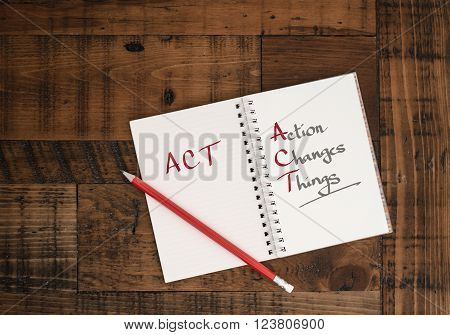 ACT - Business concept - hand-written in notebook
