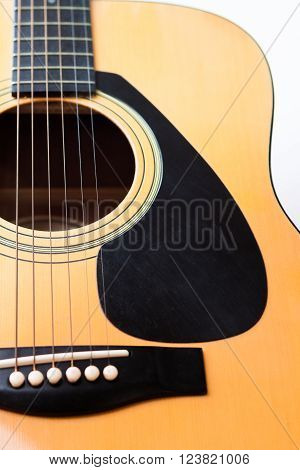 Acoustic guitar on white background, stock photo