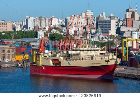 Montevideo, Uruguay - December 15, 2012: Research and survey vessel Ramform Vanguard in the Port of Montevideo, Uruguay at December 15, 2012. Montevideo in the background.
