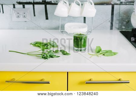 Healthy green smoothie with spinach (sorrel) in glass. rawfoodist