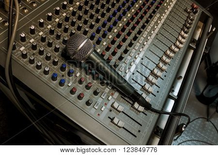 microphone on the sound mixer music background.
