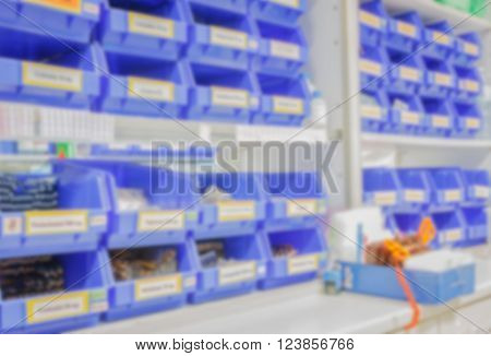 blur background drug shelves in drug store.