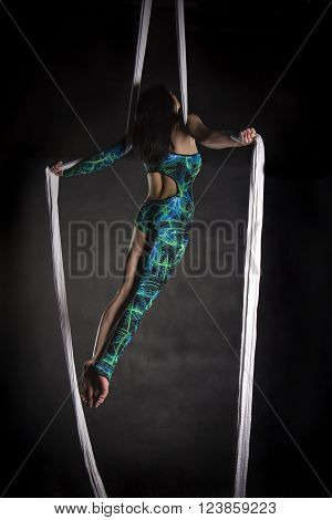 Aerialist Doing Tricks On Silks