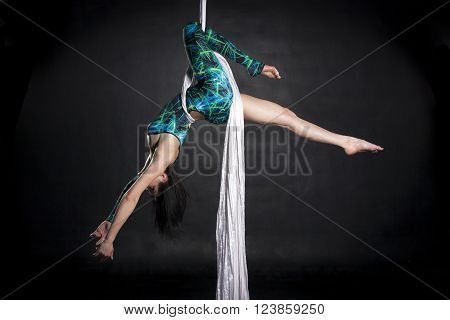 Aerialist Doing Tricks On Silks