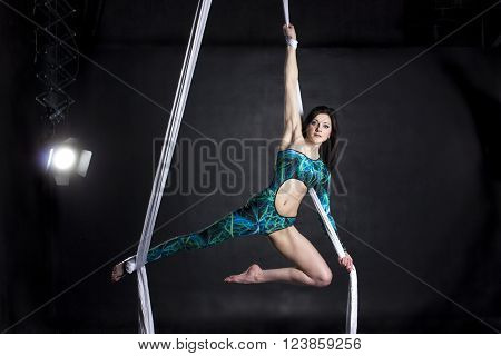 Aerialist Doing Tricks On Silks