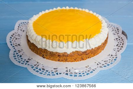Advocaat cake on blue wood background picture