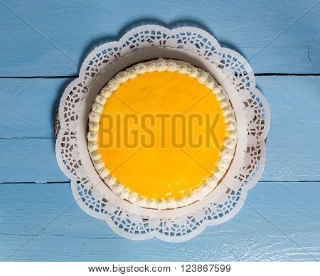 Advocaat cake on blue wood background picture