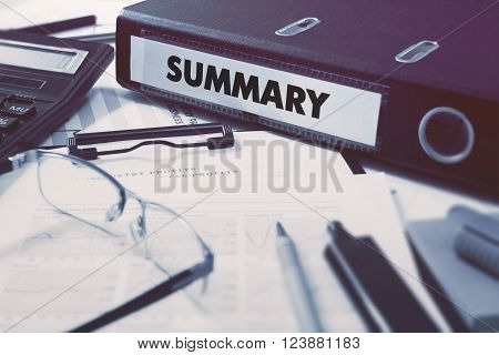 Ring Binder with inscription Summary on Background of Working Table with Office Supplies, Glasses, Reports. Toned Illustration. Business Concept on Blurred Background.