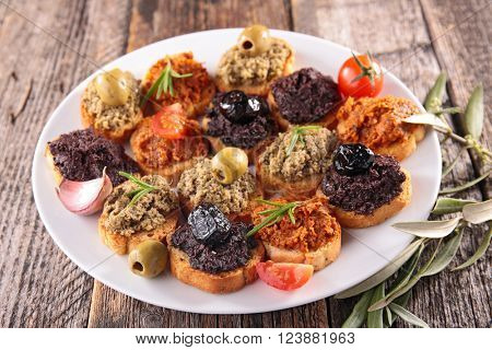 assorted canape with tapenade