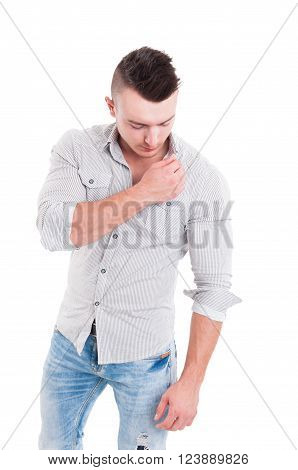 Male Model Posing And Touching The Shirt Collar
