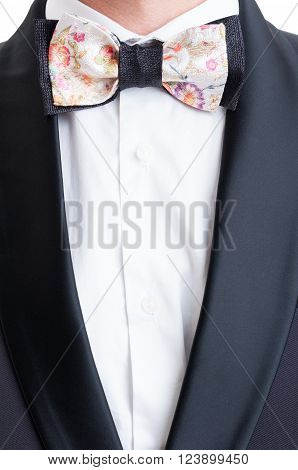Elegant suit jacket and colored custom made bow tie. Formal modern and fashionable concept