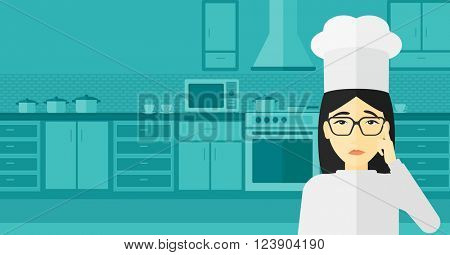 Chef pointing forefinger up.