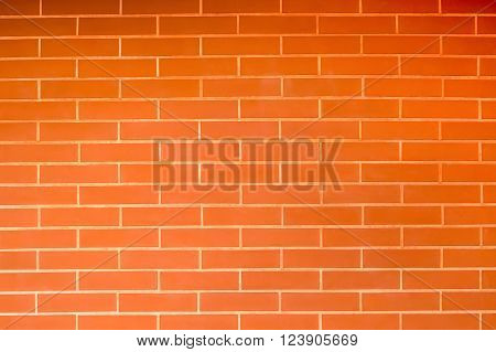 Old vintage orange red brick wall background. Texture pattern of red brick wall for wallpaper.