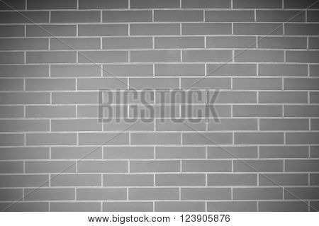 Black and white old vintage brick wall background. Texture pattern of gray brick wall for wallpaper.