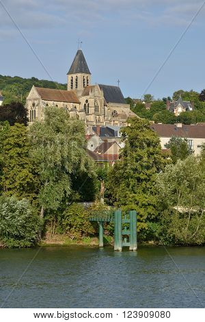 Triel sur Seine France - august 9 2015 : the picturesque city view from the left side of Seine river in summer