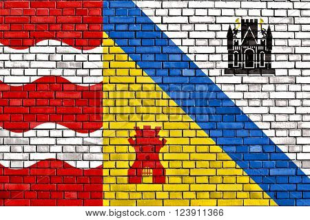 flag of Sluis painted on brick wall