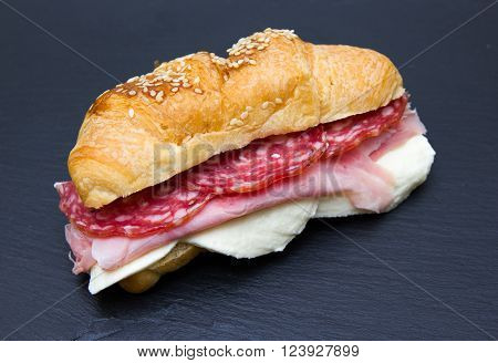 Cornetto savory filling with meats on slate top