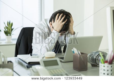The businessman who is at the wits end, and grieves