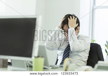 The businessman who is at the wits end, and grieves