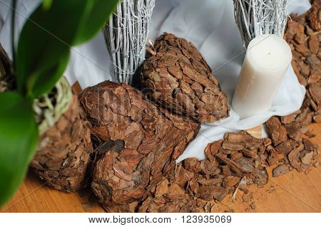 Decor in the form of the heart. Heart shaped made of tree bark. Candle bark of trees.