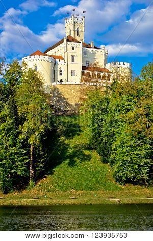 Trakoscan castle and green lake vertical view Zagorje Croatia