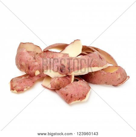 closeup of some potato peels on a white background