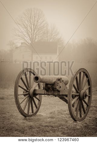 A civil war cannon in a field