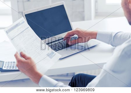business, office, school and education concept - smiling businessman working in office