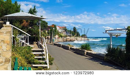 Coastline and sidewalk along the promenade in the old town of Nessebar Bulgaria. Bulgarian Black Sea coast. UNESCO World Heritage Site.
