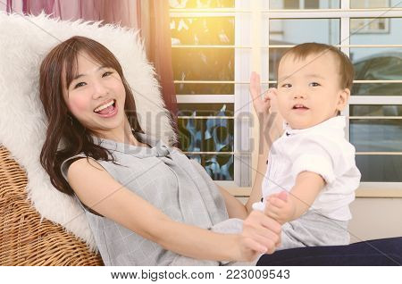 Asian mother and his cute little boy
