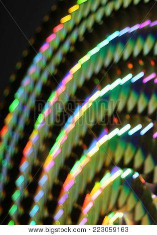 multi colored pattern, background with vibrant archs on dark background