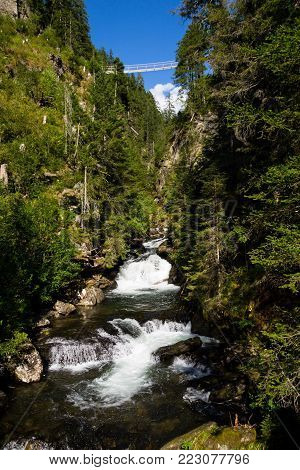Alpine Waterfall Riesachwasserfall From Lake Riesachsee Near Schladming In Austria