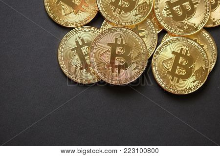 Golden bitcoin with money coins background. Bit coin cryptocurrency banking money transfer business technology